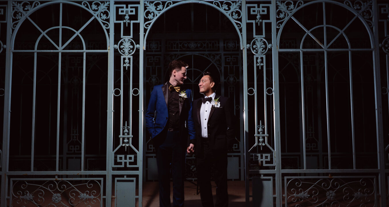 grooms posing at Ma Maison in Texas