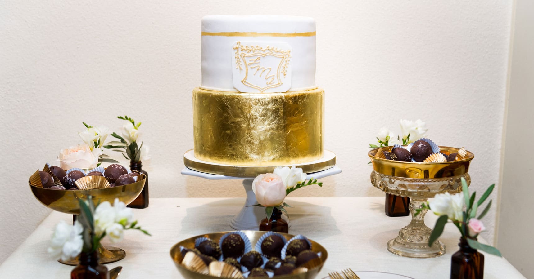 wedding cake and dessert table