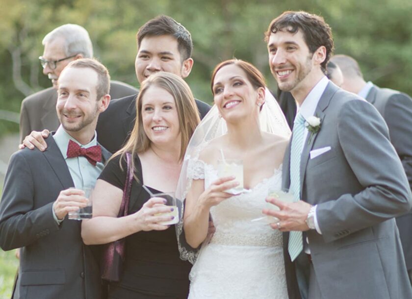 Bride and groom with guests