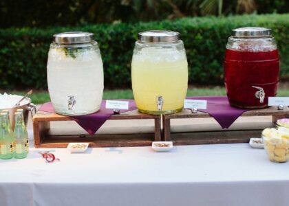 Beverage table at a wedding by Crave Catering